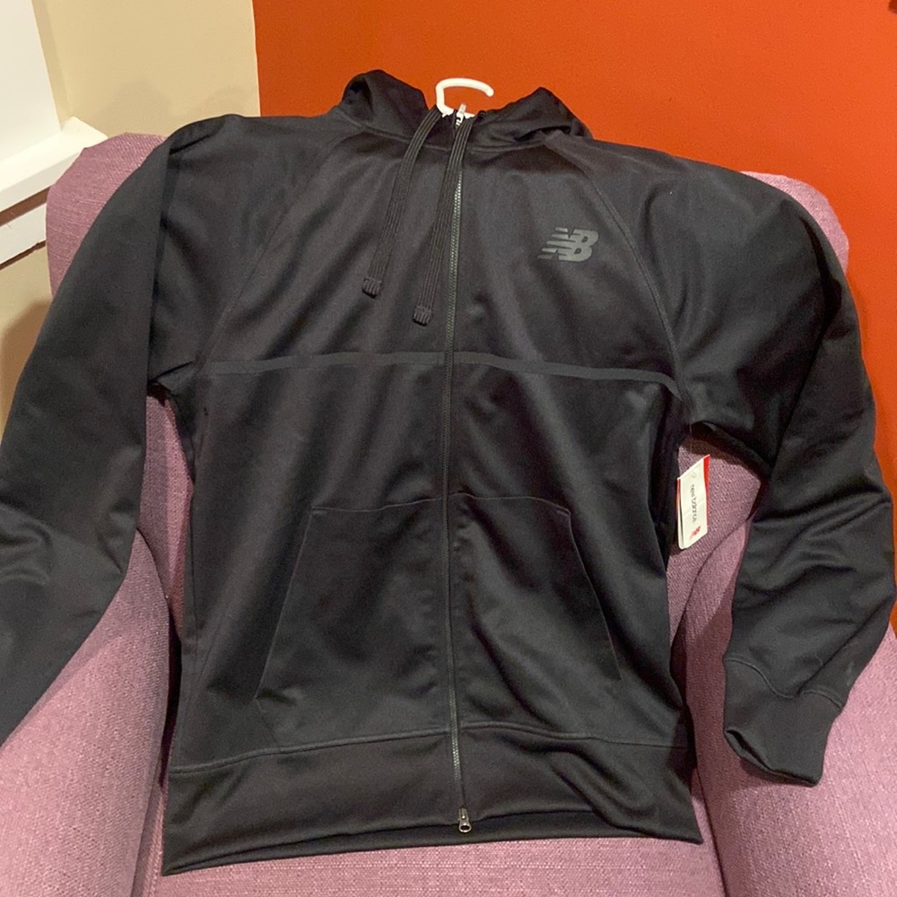 Never worn black New Balance hooded zip up sweatshirts